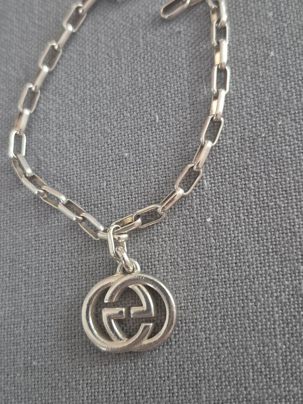 Gucci Silver Interlocking G Charm Bracele.